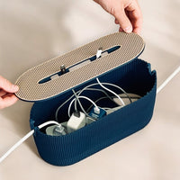 Nest Cable Box holding a power strip