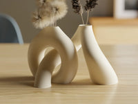 Interlocking Toroidal Vases, pair