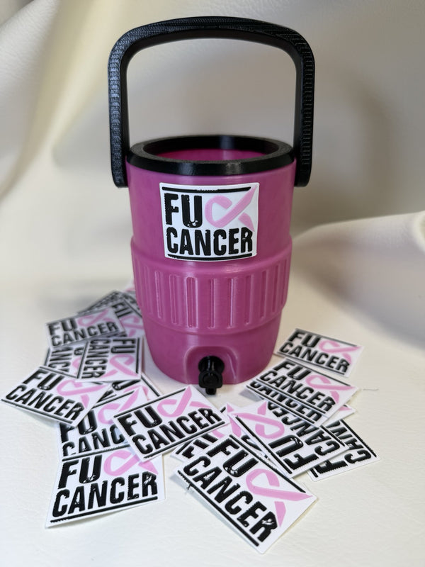 Hot-pink Blackforge mini sideline cooler with a black handle, rim and spout and a white ribbon emblem on the front, surrounded by loose emblem tags